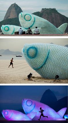 a man running on the beach next to a giant fish sculpture that looks like it's made out of plastic bottles