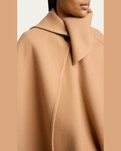 Chloe doubleface coat with a cape overlay    Round neckline; button front    Long sleeves    Straight fit    Wool/cashmere    Silk lining    Professional cleaning recommended    Made in Italy Luxury Formal Cape, Modern Cape For Workwear, Wool Cape For Formal Occasions, Classic Winter Cape For Work, Elegant Wool Cape For Fall, Classic Formal Cape For Fall, Formal Fall Outerwear With Cape Sleeves, Elegant Cape Wool Coat For Work, Elegant Winter Workwear Capelet