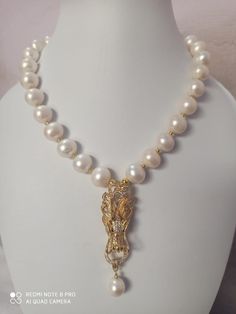 23'' 626 Carat AAA Quality Natural Fresh Water Pearl round Pearls Baroque Pearl With gold Plated Pendent Gemstone Necklace with earring Stone :Natural Fresh Water Pearl Shape : round Size :-13*13- 15*15mm Weight :- 626 carat length - 23 inch Pendent - gold Plated Polish :- Handmade Purity :- 100% Natural Gemstone color - white (If you want maximum or minimum quantity of this size other than listed, let me know, i will list/provide it to you in wholesale price.) Click below to see live stock: htt Luxury Pearl Necklace With Round Gemstone Beads, Antique Pearl Pendant Necklace, Elegant Baroque Pearl Necklace With Lobster Clasp, Elegant Single Strand Baroque Jewelry, Formal Single Strand Baroque Jewelry, Luxury Baroque Pearl White Jewelry, Luxury Single Strand Pearl Pendant Necklace, Gold Gemstone Necklaces With Baroque Pearls, Luxury Pearl Drop Necklaces For Jewelry Making