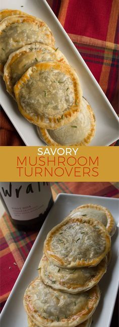 savory mushroom turnovers on a plate next to a bottle of wine