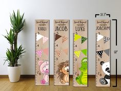 three wooden growth rulers with cartoon animals on them, each measuring the height of a plant