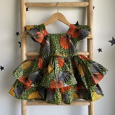 Dress for kids, Handmade in Nigeria,  Stand out from the crowd and express your individuality with a one-of-a-kind African print design. Find a style that reflects your personality, from bold and beautiful dresses to classic shirts and pants. Your purchase empowers the talented artisans of Abia State and helps preserve this special cultural tradition. Bring a touch of African vibrancy and cultural richness to your wardrobe. Order your handmade African print clothing today! Please note: Due to the handmade nature of this product, variations in color and pattern may occur. These variations enhance the uniqueness of each piece. Care Instructions: Hand wash cold or machine wash on a delicate cycle. Hang dry or dry clean. Let us know if you have any questions! Styles Ankara, Anniversary Dress, Green Tutu, African Traditional Wedding Dress, African Traditional Wedding, African Print Clothing, African Children, Baby Skirt, Handmade African