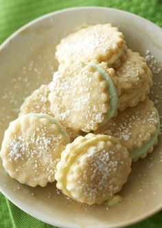 some sugar cookies are on a white plate