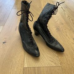 A 19th Century Pair Of Ladies High-Top Black Leather Boots, Having Pointed Toes And Sturdy Stacked Wood Louis Or "Spool" Heels And Leather Soles. Fits Like Women’s Size 7. Heels Need Resoled But Otherwise Good Condition For Age. Victorian Era Shoes, Spool Heels, High Tops Women, High Top Boots, Spool Heel, Black High Tops, Black Leather Boots, Victorian Era, Shoes Heels Boots