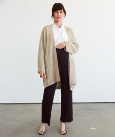 A soft and chic layering essential that promises both cute outfits and the dreamiest cuddles.Fabric Lightweight sweater knit alpaca blend with a super soft, fluffy surface texture. Fit Extra wide, loose silhouette that drapes beautifully.Stage Pregnancy → Postpartum. Stealthy snaps make it nursing-friendly. Nursing And Pumping, Nursing Sweater, Maternity Cardigan, Cardigan Design, Twin Pregnancy, Knit Alpaca, Nursing Friendly, Maternity Sweater, Pregnant Belly