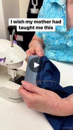 a woman is using a sewing machine to sew her jeans with the caption, i wish my mother had taught me this