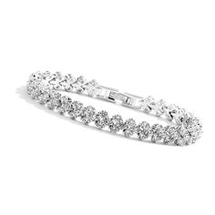 PRICES MAY VARY. 18K white gold plated cubic zirconia classic bracelet, lead free, nickel free and hypoallergenic. 7" lovely stunning crystal silver bracelet for smaller wrist. Cute silver bracelets for women, brides, bridesmaid, wedding, proms or daily wear. Simple CZ tennis bracelet, that you can wear it alone or stack it with other jewelry. Jewelry gift to your friends, your mom, daughter, or wife. Clor: Silver
 Chain Length : 7 inches
 18K White Gold Plated, Hypoallergenic.
 Perfect for ever Shiny Bracelets, Silver Tennis Bracelet, Silver Bracelets For Women, Classic Bracelets, Bracelet Crystal, Bridesmaid Wedding, Crystal Wedding, Mom Daughter, Hand Jewelry