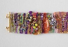 a bunch of bracelets that are sitting on a table