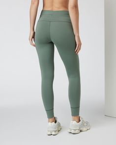 A brand-new perspective on leggings, the Daily Leggings are pulling out all the stops. Featuring our BreatheInterlock™ fabric, a high waist, a tunnel drawstring tie with a no-slip fit, 7/8 length and cuffed ankles, there’s no mistake in the name—you’ll want to wear these daily. | Vuori Daily Legging | Marsh | XXL Vuori makes premium performance apparel inspired by the active Coastal California lifestyle; an integration of fitness, surf, sport, and art. Breaking down the boundaries of traditional Stretch Athleisure Activewear With Functional Drawstring, Athleisure Activewear With Stretch, Versatile Stretch Activewear With Functional Drawstring, Stretch Activewear With Functional Drawstring For Workout, Athleisure Bottoms With Stretch And Functional Drawstring, Athleisure Stretch Bottoms With Functional Drawstring, Full Length Recycled Polyester Yoga Bottoms, Full Length Recycled Polyester Bottoms For Yoga, Full Length Yoga Bottoms In Recycled Polyester