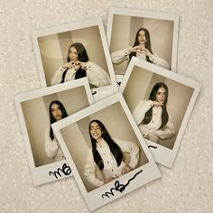 four polaroid photos of a woman with long dark hair and white coat, sitting in front of a wall