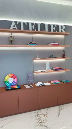 the interior of a store with shelves, books and other items on display in it