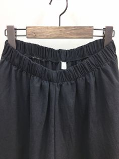 "Women's Wide Legs Cool and Light Long Shorts Knee high Short Pants Wrinkle-free Perfect for daily Size One size, good for US 4-12 Length 62cm /24.5\" Waist width 32cm /12.5\" Fabric and Care Cotton 40% Polyester 60% Made in S Korea" Non-stretch Wide Leg Shorts In Solid Color, Stretch Short Pants With Elastic Waistband, Stretch Pants With Elastic Waistband, Short Bottoms With Elastic Waistband And Loose Fit, Non-stretch Cotton Shorts, High Waist Solid Color Baggy Capris, Summer Baggy Pull-on Bottoms, Black Cotton Capris With Elastic Waistband, Casual Loungewear Bottoms With No Elasticity