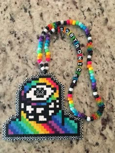 Subtronics Art, Edc Perler Bead Patterns, Subtronics Kandi, Subtronics Perler Pattern, Subtronics Perler, Rave Crafts, Trippy Perler Bead Patterns, Rave Perler Pattern