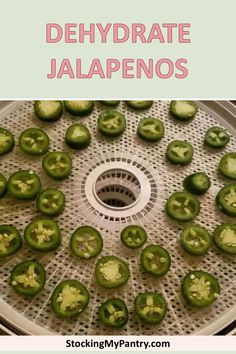 green jalapenos sitting on top of a fryer with the words dehydrate jalapenos