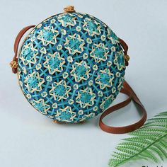 On The Go With This Gorgeous Teal & Blue Basket Style Shoulder Bag! Vibrant Sky Blue And Teal Basket Woven Purse. Small And Light Weight, Yet Room For All The Necessities! Navy Cloth Interior. 8 Inch Diameter 3 Inches Deep 3 1/2 Inch Opening 22 Inch Strap Drop Wicker Weaving, Straw Beach Bag, Bali Island, Bamboo Bag, Bamboo Weaving, Wicker Bags, Rattan Bag, Geometric Flower, Stylish Shoulder Bag