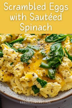 scrambled eggs with sauteed spinach in a white bowl on a yellow background