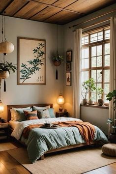 a bed room with a neatly made bed and lots of plants on the windowsill