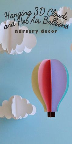 These hot air balloons float made of cardstock, the clouds and hot air balloons are light enough to be moved by even a gentle breeze. These hanging decorations would be cute hung over a crib in a nursery as a large mobile, hung in a playroom, used as party decor, or used as photo props. | nursery ideas | nursery decor |#Ad Clouds Decor, Hot Air Balloon Nursery Decor