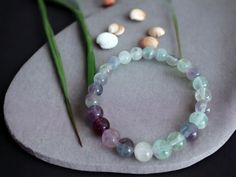 A precious stone bracelet that you can gift to yourself. This precious jewel is a fluorite bracelet. This crystal bracelet is the ideal children's gift. Our beaded bracelet model is handmade jewelry. This stone jewelry is made of precious beads. Chakras: Especially the crown chakra is extremely compatible with all chakras, including the throat and heart chakras. Gain in Use Feature: * It is recommended to use it as a neck necklace for spiritual serenity, lack of self-confidence, lack of expressi Handmade Fluorite Beaded Bracelets As Gift, Fluorite Gemstone Bracelets With Round Beads, Fluorite Natural Stone Beaded Bracelets As Gift, Fluorite Gemstone Beads Bracelets For Healing, Fluorite Gemstone Beads Bracelet For Healing, Precious Stones Bracelet, Neck Necklace, Bracelet Model, Fluorite Bracelet