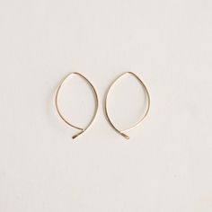 Formed by hand and with a lightly hammered end, these earrings are easy to throw on. 14k gold fill Approximately 1.25 inches long Handmade in Denver, CO Everyday 14k Gold Filled Earrings With French Hook, Everyday 14k Gold Filled Nickel Free Threader Earrings, Handmade Minimalist 14k Gold Filled Threader Earrings, Everyday Hammered 14k Gold Filled Earrings, Simple 14k Gold-filled Nickel-free Earrings, Simple 14k Gold Filled Drop Earrings, Simple 14k Gold Filled Everyday Earrings, Simple Hypoallergenic 14k Gold Filled Earrings, Minimalist Handmade 14k Gold Filled Threader Earrings