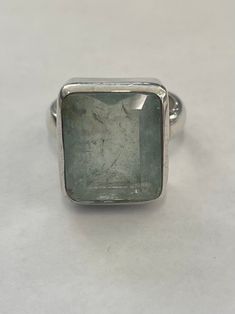 Sterling silver ring with large rectangular aquamarine. The top measures 16 x 18.5 mm ( 5/8 inches x 3/4 inches). The ring shank is about 4.5 mm wide. The ring is stamped: MD T   925 ( please note, half the stamps are worn away) Ring Shank, Rope Twist, Twisted Band, Aquamarine Ring, Aquamarine Rings, Black Stone, Rings Statement, Tiffany & Co., Sterling Silver Ring