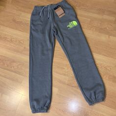 New With Tags, The North Face Coordinates Jogger Pants Size: Xs Color: Tnf Medium Gray Heather We Pull On The North Face's Coordinates Pant When It's Time To Locate The Couch After A Grueling Weekend On The Trail. The Velvety Soft Material Feels Like We're Wrapped In Clouds As We Loll In The Recliner, Dreaming Up Our Next Adventure. Standard Fit Jogger-Style Sweatpant For Kicking Back And Relaxing Cotton-Fleece Blend For Ultrasoft, Eco-Friendly Comfort Standard Fit For Low-Bulk, Low-Bunch Loungi The North Face Casual Pants For Streetwear, Casual The North Face Pants For Streetwear, Casual Streetwear Pants By The North Face, The North Face Elastic Waistband Bottoms For Loungewear, The North Face Loungewear Bottoms With Elastic Waistband, Sporty The North Face Bottoms With Pockets, The North Face Relaxed Fit Bottoms For Spring, Casual The North Face Pants With Elastic Waistband, Casual Spring Bottoms By The North Face