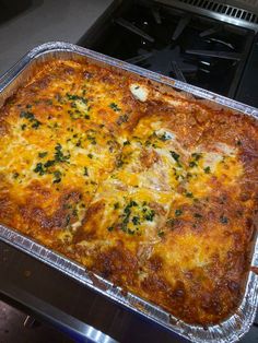 a casserole dish sitting on top of a stove