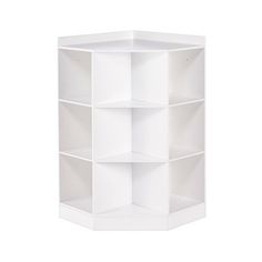 a white shelving unit with four shelves