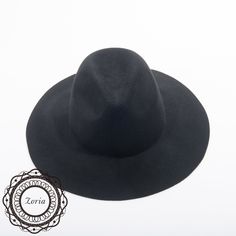 This wool felt untrimmed western style hat base. A western hat base ready for your next DIY millinery project. Easy to decorate with many of the flowers and trimmings that are available in shop. Material1: 100% Wool Felt Head size: 22.5 inch. Crown Width: 6 inch. Crown Height: 4 inch. Brim Width: 3.25 inch Floppy Brim Made in China Bohemian Fur Felt Fedora Hat, Bohemian Fur Felt Fedora, Bohemian Wide Brim Fur Felt Hat, Bohemian Felt Fedora Hat, Wide Brim Wool Mini Hats, Festival Felt Fedora Hat, Festival Wide Brim Felt Hat, Bohemian Brimmed Felt Hat, Western Style Brimmed Felt Hat