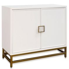 a white cabinet with gold handles and a square knob on the door, against a white background