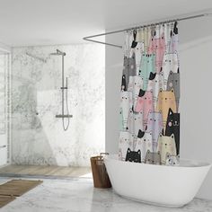 a bathroom with a bathtub, shower curtain and rug