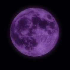 the full purple moon is seen in the dark sky