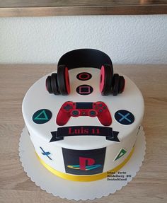 a birthday cake with a video game controller on top