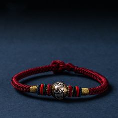 Introducing our 925 Sterling Silver Tibet Handmade Om Mani Padme Hum Luck Protection King Kong Knot Braided Bracelet a distinctive piece that combines the spiritual essence of Om Mani Padme Hum with the craftsmanship of Tibetan tradition. This bracelet is not just an accessory; it's a symbol of luck, protection, and spiritual connection. At the heart of this handcrafted masterpiece is the Om Mani Padme Hum charm, intricately designed from genuine 925 Sterling Silver. The sacred mantra is believe Symbol Of Luck, Knot Braid, Om Mani Padme Hum, Braided Bracelet, Spiritual Connection, King Kong, Braided Bracelets, Accessories Unique, Sterling Silver Charm