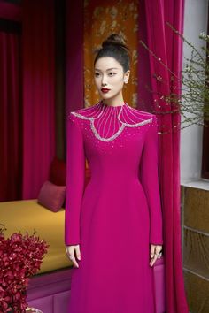 Elevate your wardrobe with the dress. Made with luxurious velvet and satin, this dress exudes elegance and sophistication. The high neck design adds a touch of refinement while the sheath silhouette flatters your figure. Perfect for a special occasion, this dress is a timeless addition to any wardrobe. * Note: The photo of the dress product is sketched based on the ao dai product and is for reference only. Dress products will not have slits on either side. Eid Suits, Corporate Woman, Suits Ideas, Corporate Women, Mean Blvd, High Neck Designs, Floor Length Dress, Dresses Xxl, Women's Evening Dresses