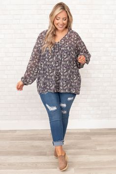 We know this will quickly become the best top in your closet! This top has a chic floral print you can dress up or down for every occasion! It's comfortable for all-day wear, has a figure-flattering fit, and features the trendiest v neck style! Pair this top with skinnies and flats for an easy everyday look! 100% Polyester Patterned Floral Print V-neck Top, Trendy V-neck Floral Print Blouse, Chic Floral Print V-neck Top, Flowy V-neck Blouse With Floral Print, Spring Relaxed Fit V-neck Top For Day Out, Spring V-neck Top For Day Out With Relaxed Fit, Spring V-neck Top For Day Out, Ditsy Floral Print V-neck Blouse For Fall, V-neck Ditsy Floral Print Blouse For Fall