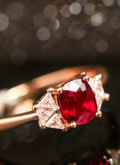 *Condition: Brand new *Center Stone: Natural Red Spinel, Cushion Cut, approx 0.83ct, 6.7x5.1mm *Side stones: Natural White Diamond trillion-cut, 0.185ct (VS1 clarity and F color) *Ring Dimension: 11 x 6mm *Gold Weight: 2.166g (depend on the gold weight) *Metal Purity: Can be select Each piece is made-to-order with care and special attention to detail. all items are made with conflict-free diamonds and gems. Size: made to order The item will be gift wrapped and shipped. -------------------------- Red Diamond Ring With Brilliant Cushion Cut, Red Cushion Cut Diamond Ring With Brilliant Cut, Red Cushion Cut Brilliant Diamond Ring, Luxury Asscher Cut Ruby Ring For Wedding, Luxury Asscher Cut Ruby Wedding Ring, Formal Cushion Cut Ruby Ring, Red Heart Cut Rings For Formal Occasions, Formal Red Heart Cut Ruby Ring, Formal Red Heart Cut Rings