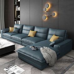 a living room with blue leather couches and yellow throw pillows on the rugs