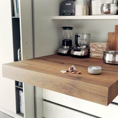 a kitchen counter with various items on it