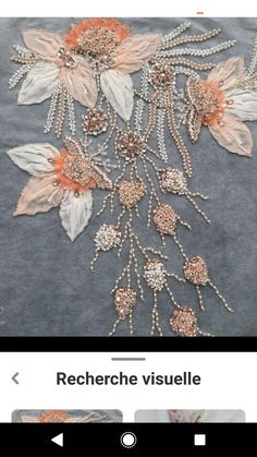 an applique with flowers and pearls on the bottom is shown in this screenshot