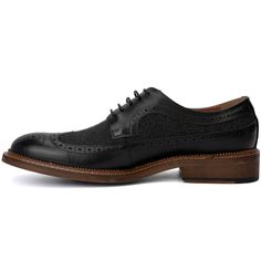 The irresistible Garret shoe by Vintage Foundry Co. exceeds expectations for a classic pair of oxfords. With its delicate design and dual-tone construction, this lace-up style stands out and demands a second look. Perfectly blending timeless elegance with a modern twist, the Garret shoe elevates any outfit, whether formal or smart-casual. Its distinctive look and superior craftsmanship ensure you make a memorable impression, combining sophistication with a bold, eye-catching design. Black Wingtip Lace-up Shoes With Textured Sole, Black Lace-up Shoes With Leather Sole And Wingtip Design, Black Oxford Lace-up Shoes With Plain Toe, Black Wingtip Oxfords With Textured Sole, Black Wingtip Brogue Lace-up Shoes, Black Oxford Lace-up Shoes, Black Business Oxfords With Textured Sole, Black Oxford Lace-up Shoes With Rubber Sole, Black Wingtip Dress Shoes With Brogue Detailing