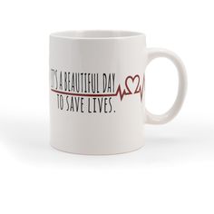 a white coffee mug with the words, it's beautiful day to save lives