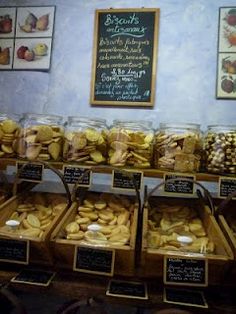 many jars filled with different types of food