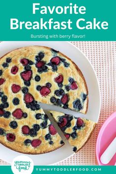 a blueberry and raspberry cake on a white plate with the words favorite breakfast cake