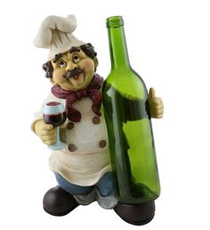 a statue of a man holding a wine bottle