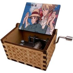 a wooden music box with an image of two people on it