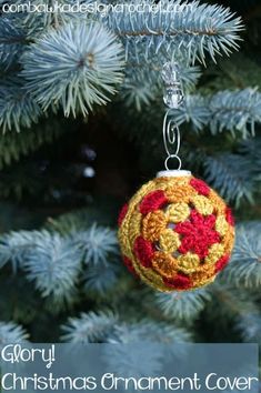 a crocheted christmas ornament hanging from a tree