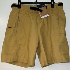 The North Face Ripstop Men’s Cargo Shorts Color Tan 5 Pockets Adjustable Belt 100% Authentic New Whit Tags. Casual Shorts By The North Face For Outdoor Activities, Casual The North Face Bottoms For Outdoor Activities, Sporty Bottoms With Pockets For Camping, The North Face Bottoms With Pockets For Outdoor Activities, Sporty Camping Bottoms With Pockets, Cotton Bottoms With Pockets For Camping, Summer Bottoms With Pockets For Outdoor Work, Khaki Camping Shorts With Pockets, The North Face Bottoms With Elastic Waistband For Outdoor