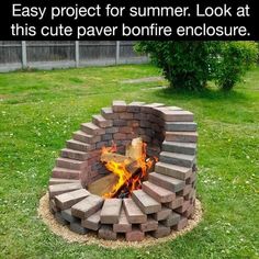 a fire pit in the middle of a yard