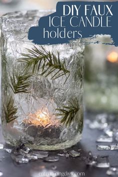 an ice candle holder with pine branches in it and text overlay that reads diy faux ice candle holders